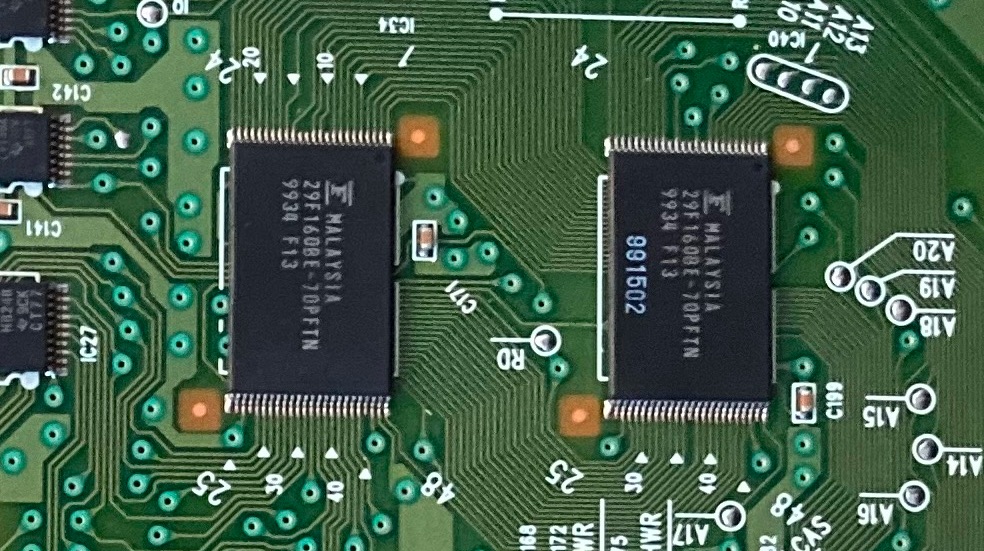 Close-up photo of two flash ICs on the main circuit board of the ES-1.